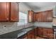 Kitchen sink featuring granite countertops, stainless steel appliances, and a tile backsplash at 8325 Burgundy Ridge Dr, Harrisburg, NC 28075