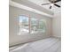 Bright bedroom with large windows, neutral paint, and carpet at 8343 Highlander Ct, Charlotte, NC 28269