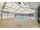 Indoor pool with a retractable ceiling and access to the backyard at 8343 Highlander Ct, Charlotte, NC 28269