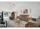 Spacious living room with vaulted ceilings, neutral walls, and a large area rug at 8529 Indian Summer Trl, Harrisburg, NC 28075