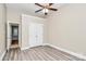 Bedroom with closet, ceiling fan, hard surface floors and painted neutral color at 11305 Hunters Landing Dr, Charlotte, NC 28273