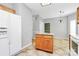 Spacious kitchen featuring a center island, white refrigerator, and open layout at 11305 Hunters Landing Dr, Charlotte, NC 28273