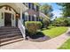 Charming home featuring a brick entrance and manicured landscaping at 1134 Willow Oaks Trl, Matthews, NC 28104