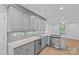 Updated kitchen with stainless steel appliances, granite countertops, and modern lighting at 11401 Lone Star Cir, Charlotte, NC 28226