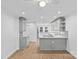Bright and airy kitchen with granite countertops, stainless steel appliances, and modern finishes at 11401 Lone Star Cir, Charlotte, NC 28226