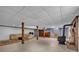 Large open basement with fireplace, piano, and ample space at 137 Proust Rd, Statesville, NC 28625