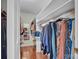 Walk-in closet with ample storage and shelving, filled with a variety of clothing at 137 Proust Rd, Statesville, NC 28625