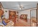 Bright and comfortable living room with hardwood floors and a classic brick fireplace at 137 Proust Rd, Statesville, NC 28625