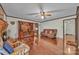 Comfortable living room with hardwood floors and entertainment center at 137 Proust Rd, Statesville, NC 28625
