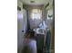 Functional bathroom with a sink, toilet, and shower/tub combination at 1512 Thompson Ave, Charlotte, NC 28216