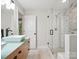 Bright bathroom with a floating vanity, a frameless glass shower, and modern fixtures at 1711 Apple Tree Ln # 28, Fort Mill, SC 29715