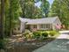 Inviting two-story home with stone accents, landscaped front yard, and concrete driveway at 1711 Apple Tree Ln # 28, Fort Mill, SC 29715