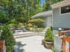 Exterior view of a house with landscaped yard, stone steps, and a white front door at 1711 Apple Tree Ln # 28, Fort Mill, SC 29715