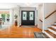 Bright foyer featuring hardwood floors, decorative double front doors and a staircase at 1711 Apple Tree Ln # 28, Fort Mill, SC 29715