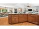 Kitchen island features marble countertops, ample storage, and a view into the adjacent dining and living areas at 1711 Apple Tree Ln # 28, Fort Mill, SC 29715