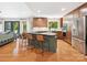 Open kitchen featuring a spacious island, stainless steel appliances and natural lighting at 1711 Apple Tree Ln # 28, Fort Mill, SC 29715