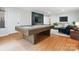 Recreation room with a pool table, stylish decor, and hardwood floors at 1711 Apple Tree Ln # 28, Fort Mill, SC 29715