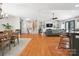 Spacious living room features hardwood floors, built-in shelving, and a staircase leading to the upper level at 1711 Apple Tree Ln # 28, Fort Mill, SC 29715