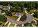 Aerial view of the property surrounded by lush greenery and a cul-de-sac at 2124 Congress Ct, Kannapolis, NC 28083