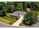 Aerial view showcasing the home's location within a tree-lined cul-de-sac at 2124 Congress Ct, Kannapolis, NC 28083