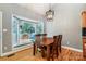 Bright dining area with lots of natural light from the bay window overlooking the backyard at 2124 Congress Ct, Kannapolis, NC 28083