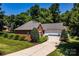 Charming brick home with well-manicured lawn and a two-car garage at 2124 Congress Ct, Kannapolis, NC 28083