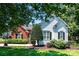 Picture of home showcasing the blend of brick and siding and the mature landscaping at 2124 Congress Ct, Kannapolis, NC 28083