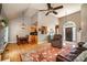 Bright open floor plan of living room and kitchen with hardwood floors, and lots of light at 2124 Congress Ct, Kannapolis, NC 28083