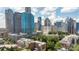 Enjoy breathtaking city views from this condo, showcasing iconic buildings and a vibrant urban landscape at 229 N Church St # 100, Charlotte, NC 28202