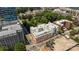 An aerial view of the property showcasing its architectural design and its location relative to surrounding cityscape at 229 N Church St # 100, Charlotte, NC 28202