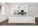 Bright kitchen with stainless steel appliances, large center island, and modern finishes at 229 N Church St # 100, Charlotte, NC 28202