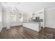 Kitchen with stainless steel appliances, hardwood floors, ample counter space and modern lighting at 229 N Church St # 100, Charlotte, NC 28202