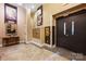 A modern lobby with convenient mailboxes, sleek flooring, and stylish decor for a refined first impression at 229 N Church St # 100, Charlotte, NC 28202