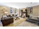 Lobby/lounge area showcasing leather furniture, decorative accents, and a cozy fireplace at 229 N Church St # 100, Charlotte, NC 28202