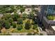 Overhead view capturing property's integration with lush green spaces, creating an appealing contrast to the urban setting at 229 N Church St # 100, Charlotte, NC 28202