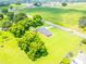 An aerial image displaying the house surrounded by large trees and green lawns at 24132 Nc Hwy 73 Hwy, Albemarle, NC 28001
