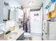 Bathroom featuring a shower stall with storage shelves and decorative accents at 24132 Nc Hwy 73 Hwy, Albemarle, NC 28001