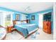 Cheerful bedroom with a ceiling fan and a large dresser, full of decor at 24132 Nc Hwy 73 Hwy, Albemarle, NC 28001