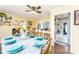 Charming dining room featuring a table set for a meal, adjacent to a kitchen bar and hallway at 24132 Nc Hwy 73 Hwy, Albemarle, NC 28001