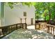 Large wooden deck offers outdoor living space and access to the home's backyard at 2830 Grosbeak Ln, Charlotte, NC 28269