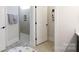 Modern bathroom featuring a tiled walk-in shower with a convenient niche and crisp, clean design at 3006 Constitution Ln, Gastonia, NC 28056