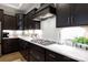Bright kitchen featuring stainless steel appliances and modern cabinetry, creating a stylish design at 3006 Constitution Ln, Gastonia, NC 28056