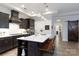 Open concept kitchen with a large island, bar seating, and modern finishes, perfect for entertaining at 3006 Constitution Ln, Gastonia, NC 28056