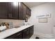 Well-appointed laundry room with ample cabinet space, modern appliances, and stylish decor at 3006 Constitution Ln, Gastonia, NC 28056