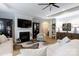 Inviting living room with a fireplace, built-in shelving, neutral colors, and an open concept design at 3006 Constitution Ln, Gastonia, NC 28056