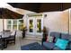 Charming patio area with outdoor seating, lush plants, and a welcoming ambiance for entertaining at 3006 Constitution Ln, Gastonia, NC 28056