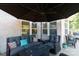 Inviting outdoor patio featuring comfortable seating, a fire pit, and a shaded umbrella at 3006 Constitution Ln, Gastonia, NC 28056