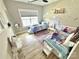 Charming ' bedroom with whimsical decor, two beds, and ample natural light creating a cozy and playful atmosphere at 305 Pleasant Hill Se Dr, Concord, NC 28025