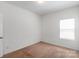 Neutral bedroom featuring a single window and carpeted flooring at 3296 Saddlebrook Dr, Midland, NC 28107