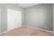 Neutral bedroom with wall-to-wall carpet and ample closet space at 3296 Saddlebrook Dr, Midland, NC 28107